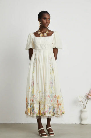 Woman wearing Maxi Floral Dress Puff Arms short linen white 