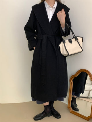 Elegant black cashmere wool coat with a belted waist and large lapel, showcasing its sophisticated double-sided design. Cielie Max Mara Coat 