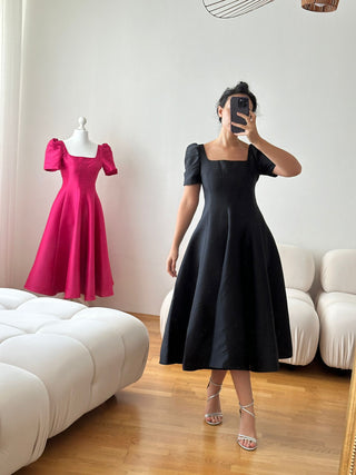 Vintage style Dior-inspired elegant black cocktail dress, midi A-line flared gown, Cielie Vienna designer fashion, perfect for rentals, balls, and shopping in Vienna.