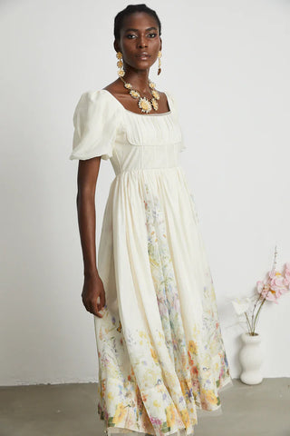Woman wearing Maxi Floral Dress Puff Arms short linen white 