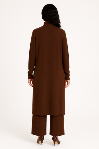Brown long coat worn by a person on a white background