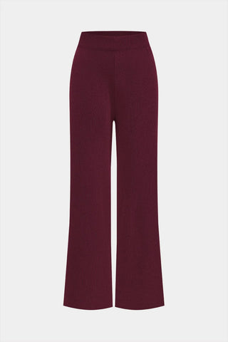 Maroon pants on a white background