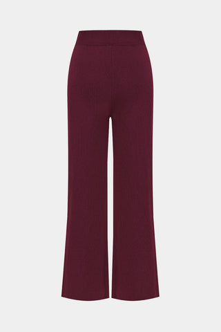 Maroon pants on a white background