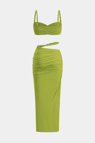 Green ruched dress with matching top on a white background