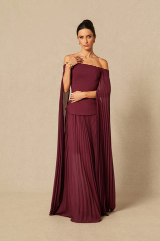 Model wearing burgundy off-shoulder two-piece formal set with pleated chiffon cape sleeves and maxi skirt Burgundy Winter Winered Chiffon Pleated Skirt 