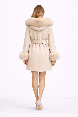Beige coat with fur hood and cuffs on a white background