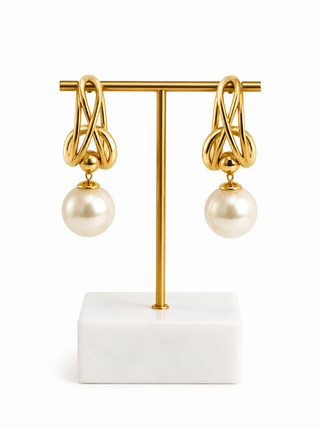 PORTOFINO gold plated copper pearl statement earrings with sculptural intertwined design and oversized pearl drops