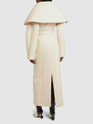 Long beige coat with a wide collar on a white background