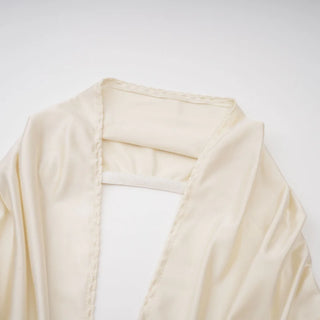 Beige robe on a white background