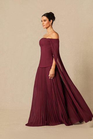 Model wearing burgundy off-shoulder two-piece formal set with pleated chiffon cape sleeves and maxi skirt Burgundy Winter Winered Chiffon Pleated Skirt 
