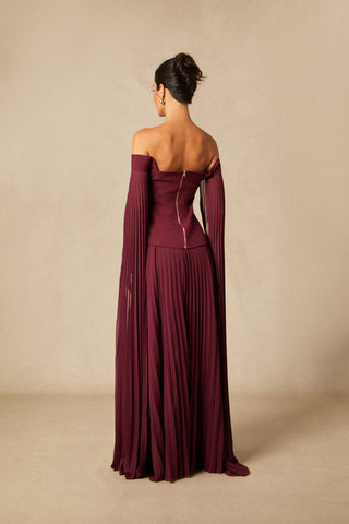 Model wearing burgundy off-shoulder two-piece formal set with pleated chiffon cape sleeves and maxi skirt Burgundy Winter Winered Chiffon Pleated Skirt 