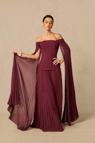 Model wearing burgundy off-shoulder two-piece formal set with pleated chiffon cape sleeves and maxi skirt Burgundy Winter Winered Chiffon Pleated Skirt 