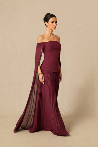 Model wearing burgundy off-shoulder two-piece formal set with pleated chiffon cape sleeves and maxi skirt Burgundy Winter Winered Chiffon Pleated Skirt 