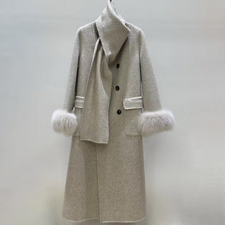 Gray coat with fur-trimmed cuffs on a white background