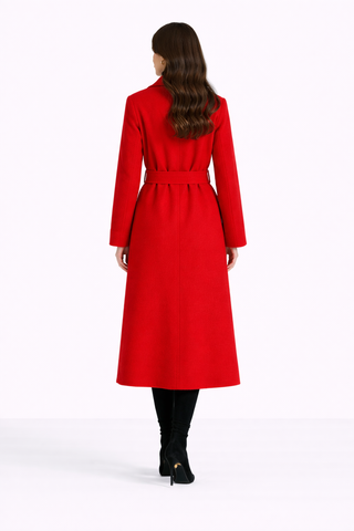 Person wearing a red coat on a white background