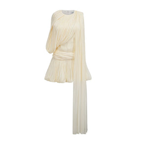 Cream-colored pleated dress on a white background