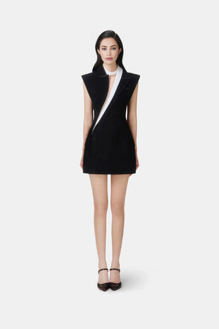 Designer black mini dress with white contrast and detachable oversized bow from Cielie Vienna collection. Perfect black and white cocktail dress for evening events or available for cocktail dress rentals in Vienna. Haley Dress