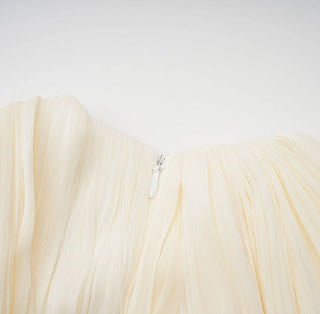 Light beige fabric with a zipper on a white background