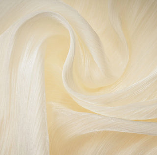 Close-up of beige fabric with a soft texture