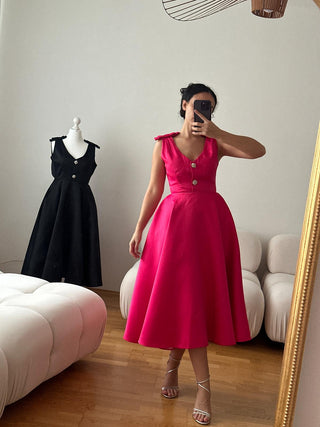 Pink elegant midi cocktail dress embellished with crystal stones, featuring a chic design, perfect for cocktail parties, formal events, and special occasions.