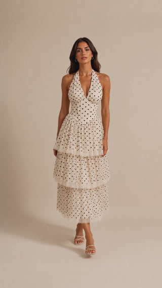 Dianna ivory polka dot halter midi dress with structured corset bodice, tiered tulle skirt, feminine fit and flare silhouette, elegant wedding guest and cocktail occasion dress.