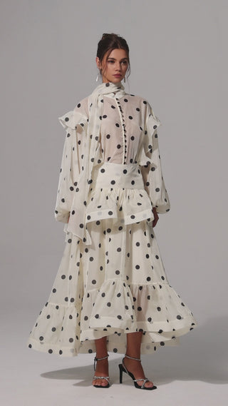 Model wearing full Julia Polkadot Set with blouse, maxi skirt, and matching scarf in ivory with black polka dots, front view